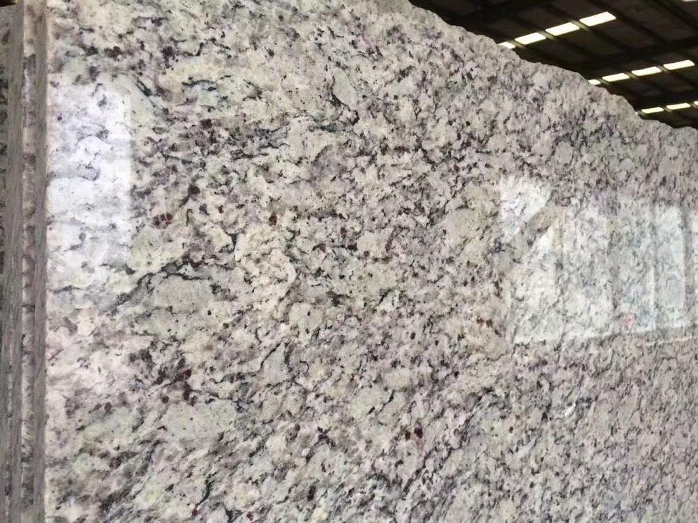 Polished Samoa granite slab, white with dense grey and black crystals