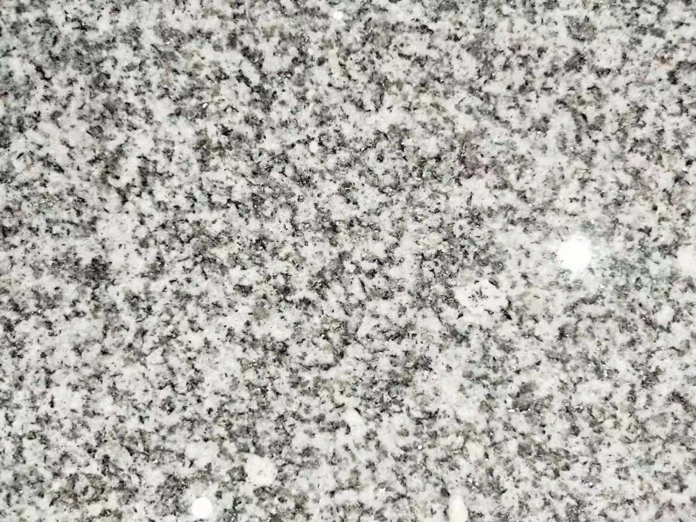 Tongan White granite slab, even grey and white grain
